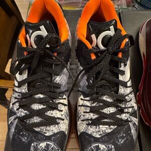 Nike Black and Orange High-Top Athletic Shoes